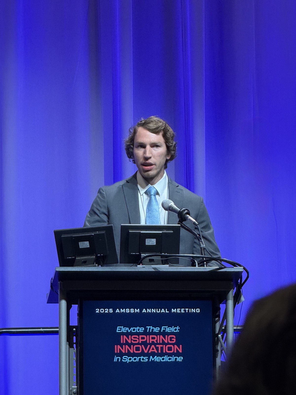 Dr. Swisher presenting at the 2025 AMSSM Annual Meeting